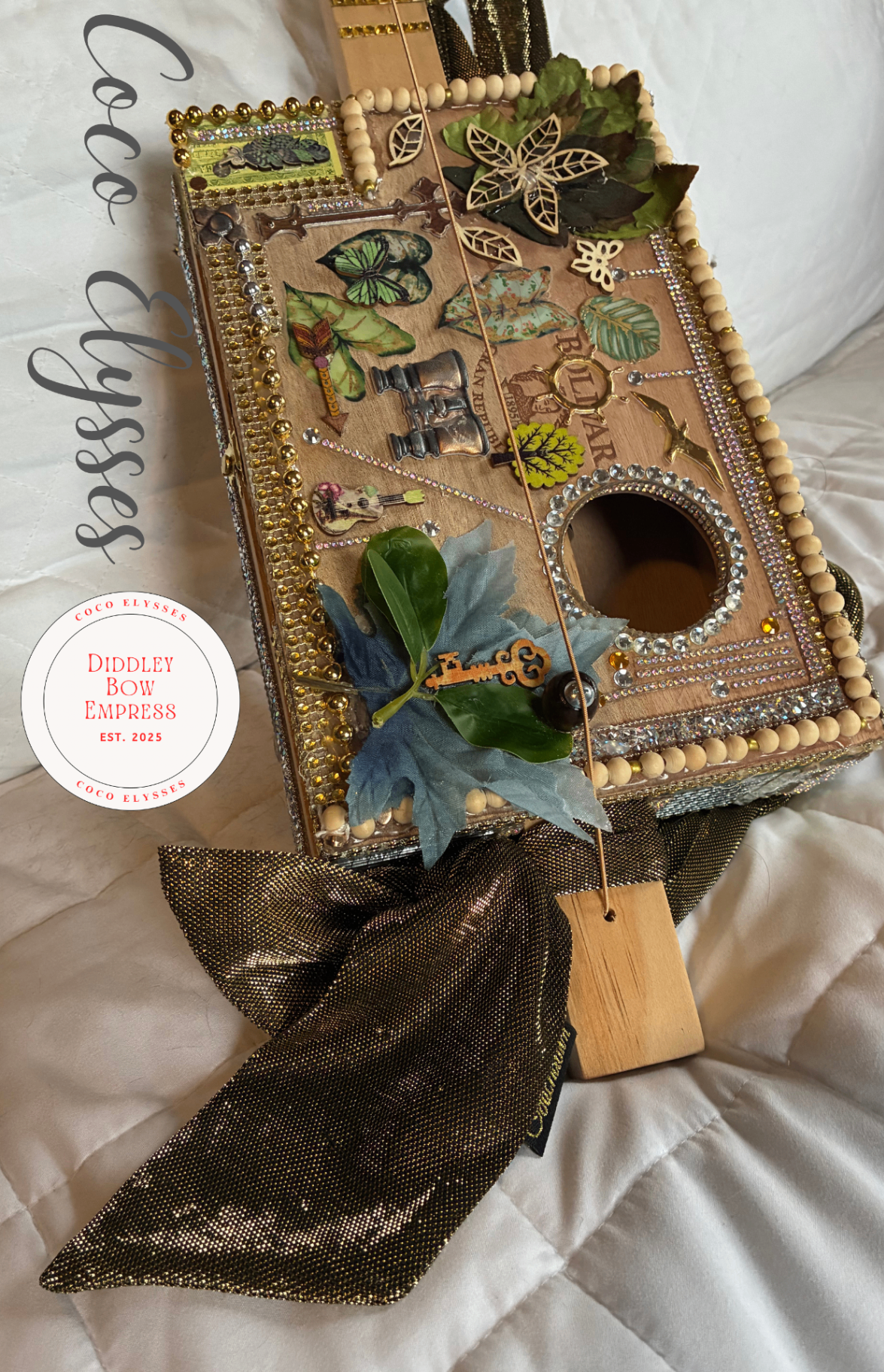 A decorated Diddley Bow created in Coco Elysses' workshop